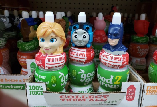 Kids fruit drinks with famous trademarked character heads on top.