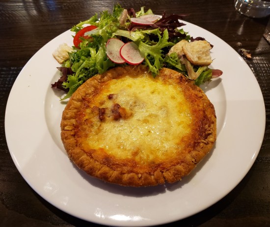 Bacon and Leek Quiche with mixed greens salad.