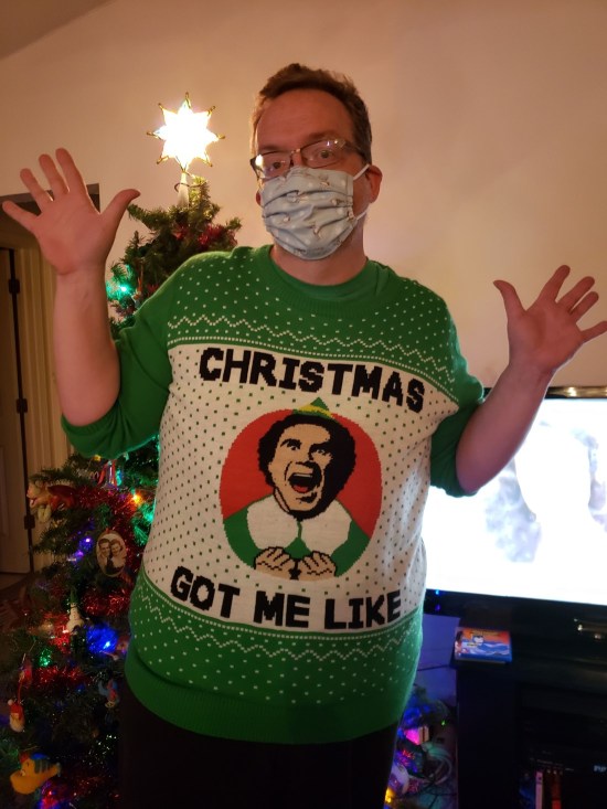 me wearing my Buddy the Elf sweater.