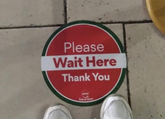 social distancing floor decal.