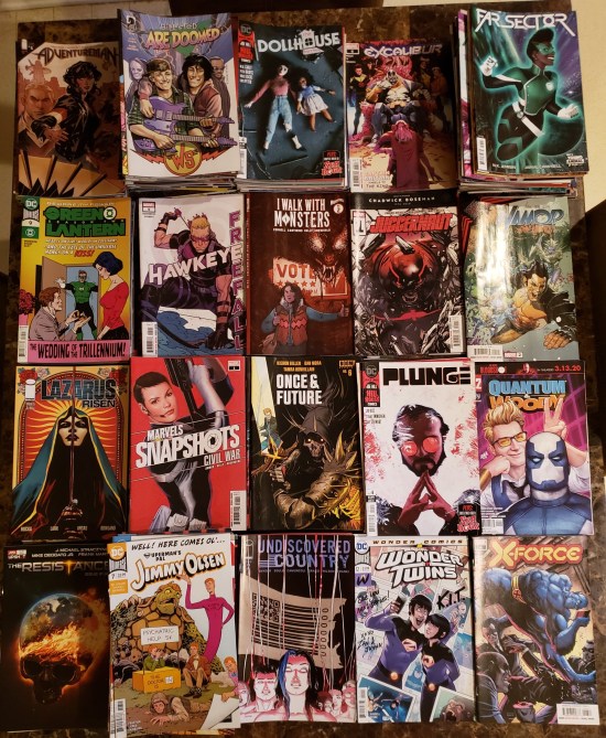 Alphabetized piles of comic books published in 2020.
