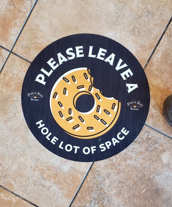 social distancing floor decal.