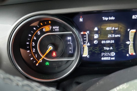 Green 'A' in a circle on the dashboard.