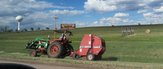 Wall Drug signs and tractor.