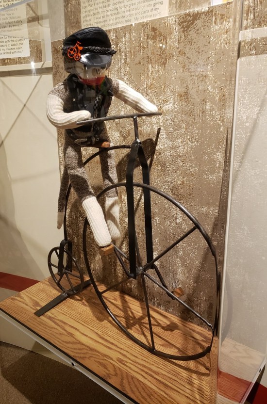 high wheeled bike sock monkey!