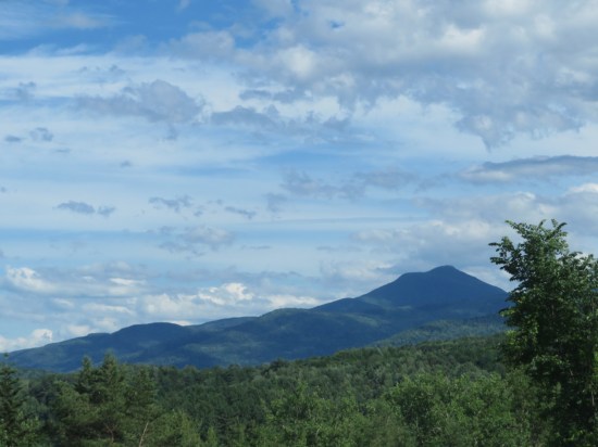 Cloud shadows across the Green Mountains. Very cloudy day.