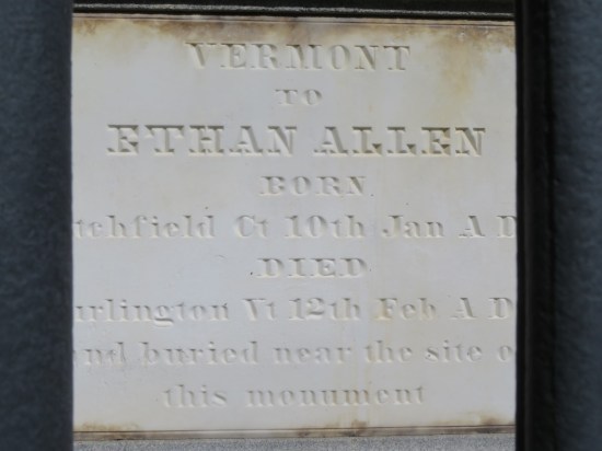 Stone inscription on the side of the Ethan Allen monument noting his nearby burial and dates (1738-1789).