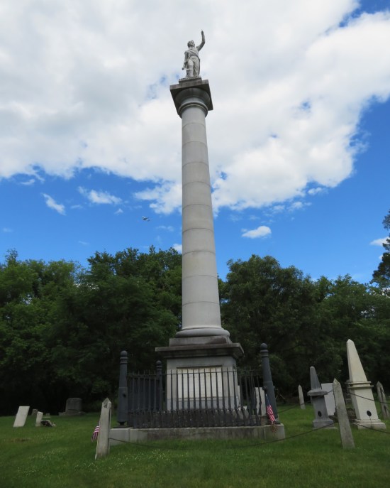 The Ethan Allen monument stands on a 35-foot column in a somewhat small cemetery.