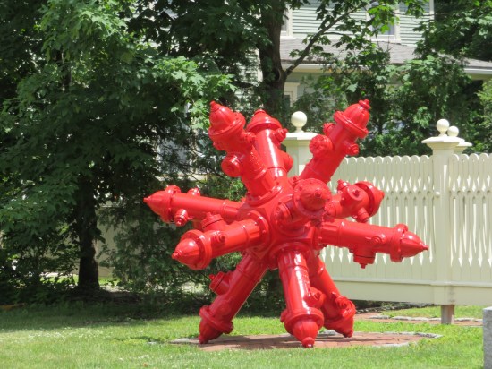 giant child's jack made of fire hydrants