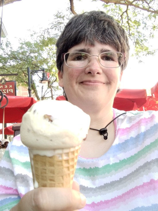Anne holding an ice cream cone at you.