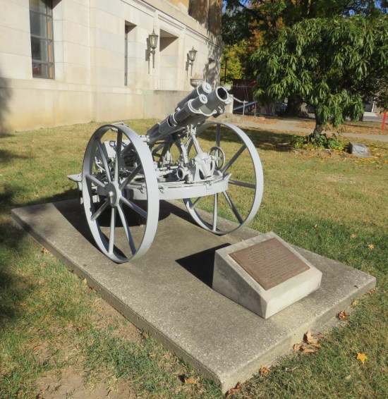WWI German 77mm trench mortar beside the courthouse.