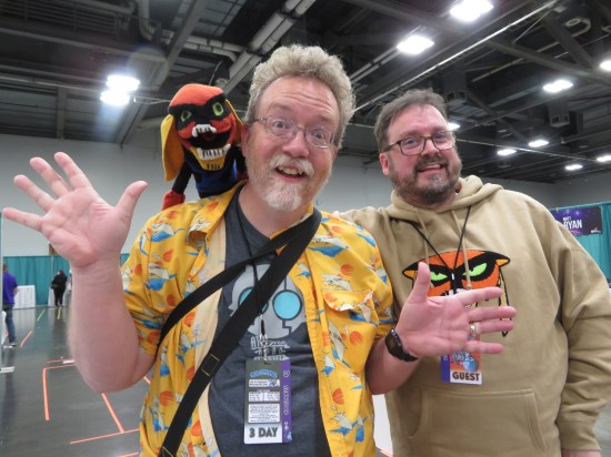 Me doing jazz hands with Andy Merrill while his Brak puppet stares at me.