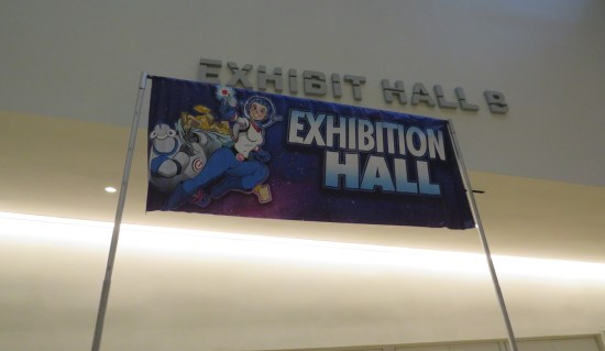 An Exhibit Hall sign looming overheard.