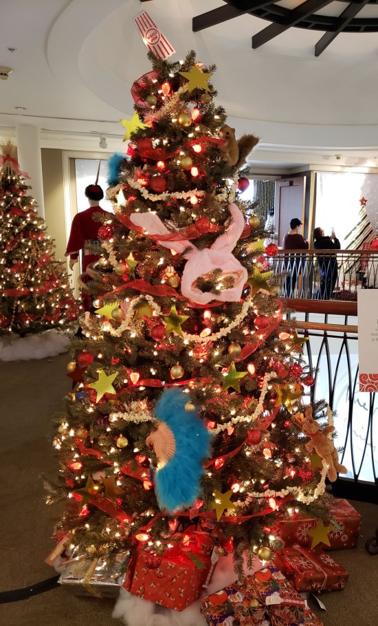 Christmas tree with replica film props, such as Ralphie's bunny ears from "A Christmas Story".