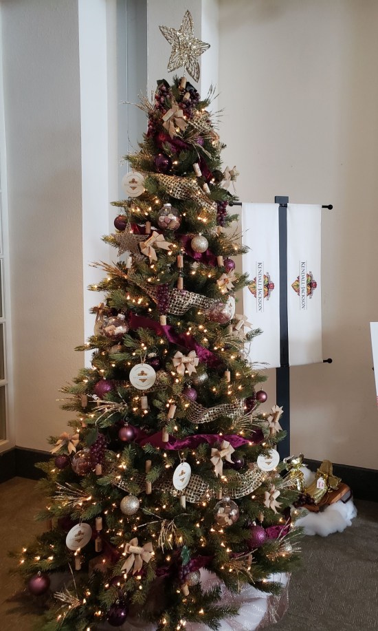 Christmas tree with purple trimmings.