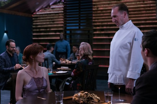Anya Taylor-Joy and Ralph Fiennes face off as diner and chef in "The Menu".