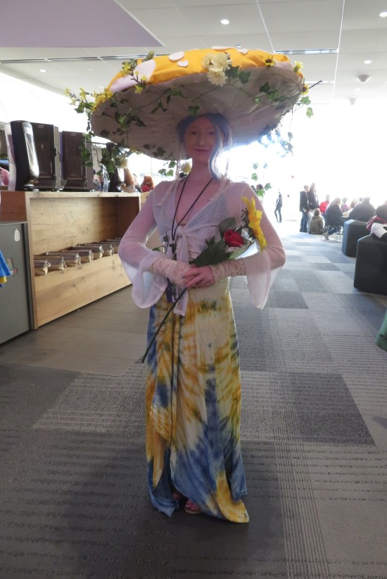 Cosplay: yellow mushroom anime woman? We don't know.