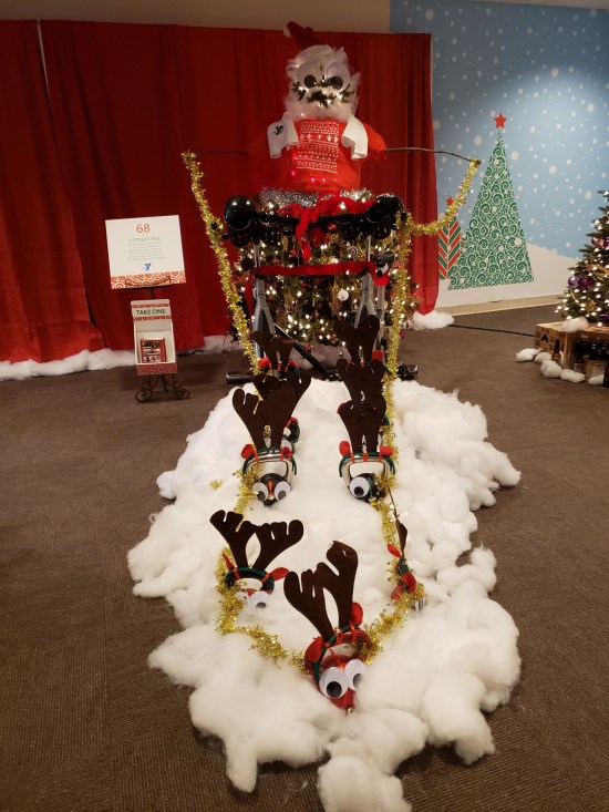 YMCA turned a Christmas tree into a big Santa and added reindeer.