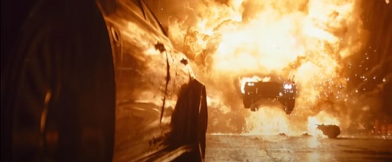 The Batmobile jumping through an explosion in "The Batman".