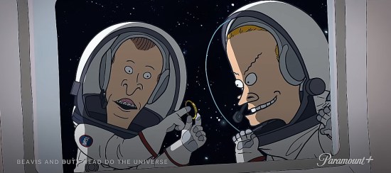 Beavis and Butt-Head in astronaut suits, space-walking and mid-rude-gesture. Don't ask.