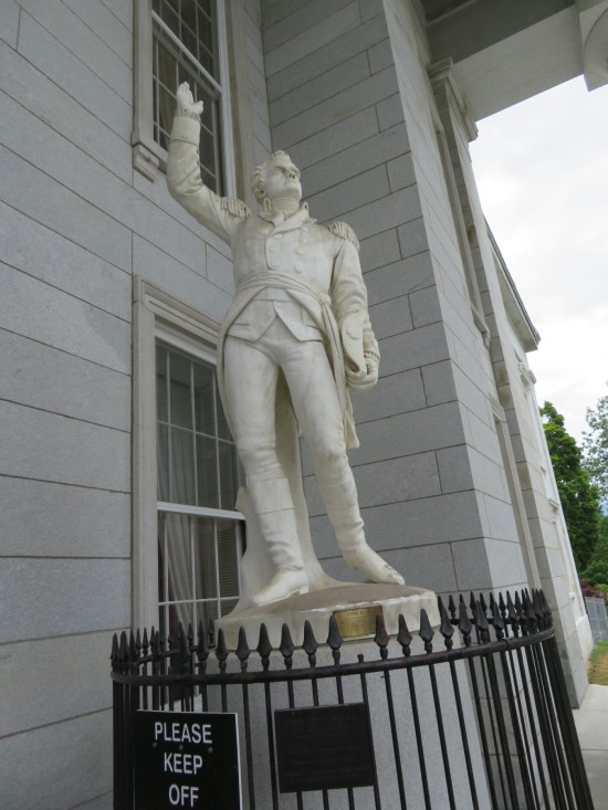 Am Ethan Allen statue on the State House front porch.