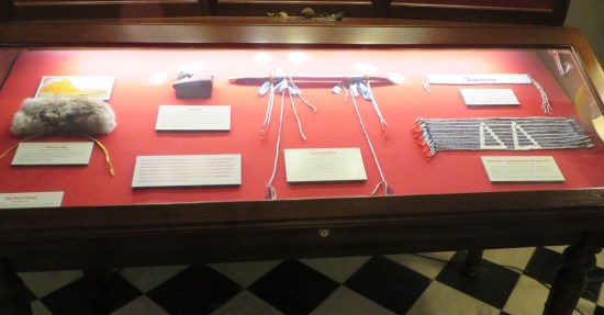 Glass case of indigenous artifacts required of every museum or museum-shaped building.