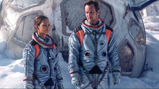 Halle Berry and Patrick Wilson as astronauts just standing there looking pained.
