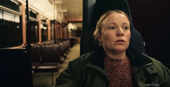 Ebba, not a licensed driver, sits in an empty tram's driver's seat, accidentally starts it up and tries to stay calm.