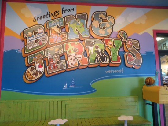 The Ben & Jerry's logo painted big and brightly on an indoor wall.