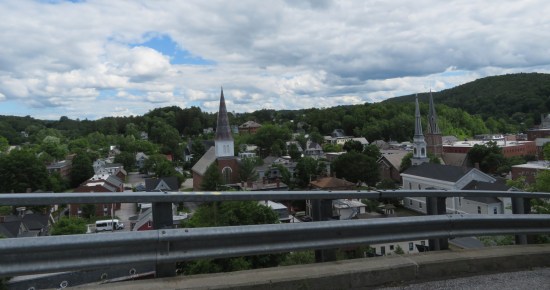 Downtown Montpelier as seen from the highway bridge coming into town. An above-average number of steeples poke upward.