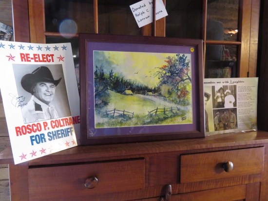 James Best objects: a poem he wrote, a painting he painted, and a fake Sheriff Rosco campaign poster.