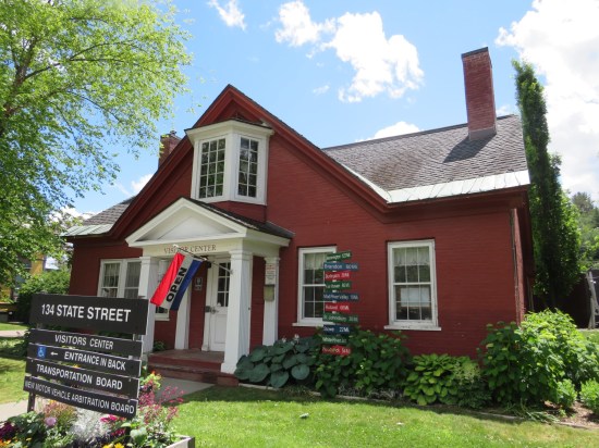 Ranch-style brick building, well-kept and with ample signage.