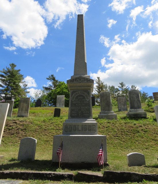 A monumental tombstone for Coolidge's grandpa at least ten feet tall.