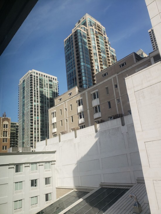 An angled view out our hotel window, filled with Chicago skyscrapers, but none of the cool distinctive ones.