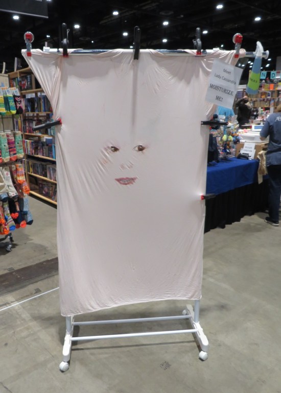 A recreation of a character who's just a large patch of stretched-out human skin with a tiny creepy lady-face in the middle.