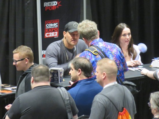 Faraway shot of me chatting with David Boreanaz at his table.