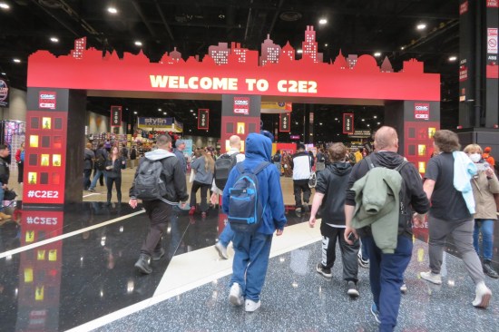 A bunch of us rushing through the C2E2 welcome gate into the exhibit hall, threatening to trample anyone who stopped for photos.
