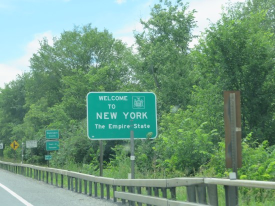 A green "Welcome to New York" sign along US-4 West as we left Vermont.