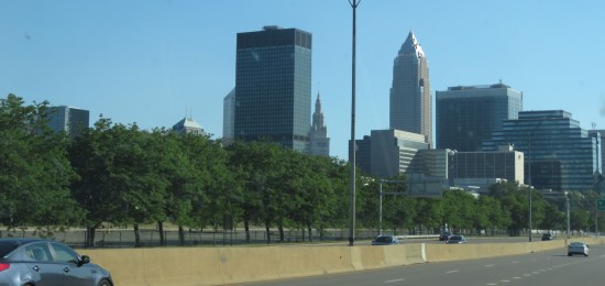 A section of downtown Cleveland in thedistance. Trees line our interstate route.
