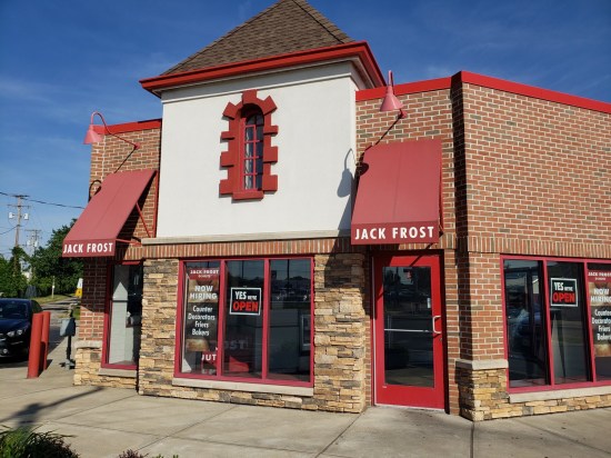The front of Jack Frost Donuts, red and white.