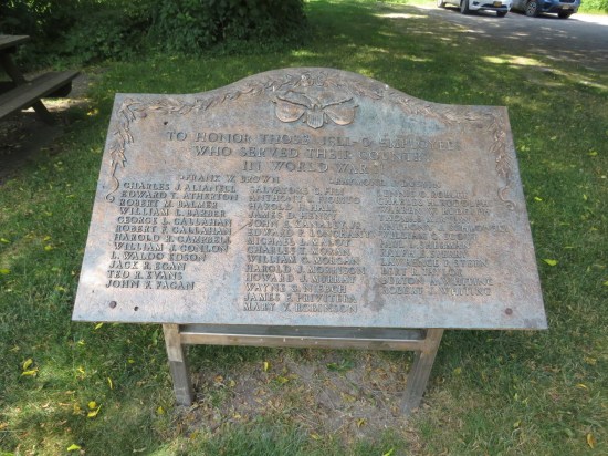 A metal plaque outside on one-foot legs lists all the Jell-O employees who served in WWII.