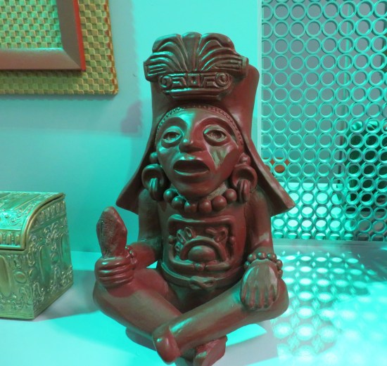 A weird pre-Colombian statue that always sat in Captain Kirk's quarters but was never explained, definitely from Latin America, Earth.