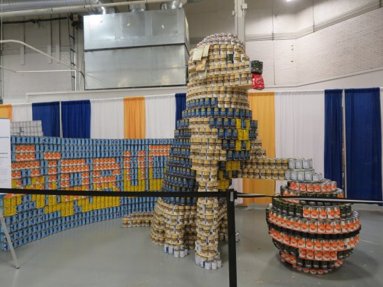Air Bud the basketball-playing movie dog and a basketball, made of cans.