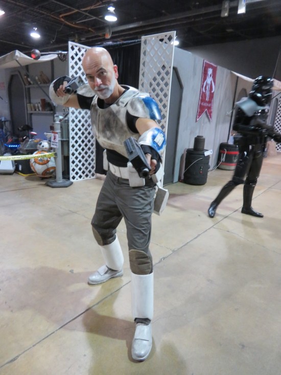 older, balder Clonetrooper Captain Rex with gun.