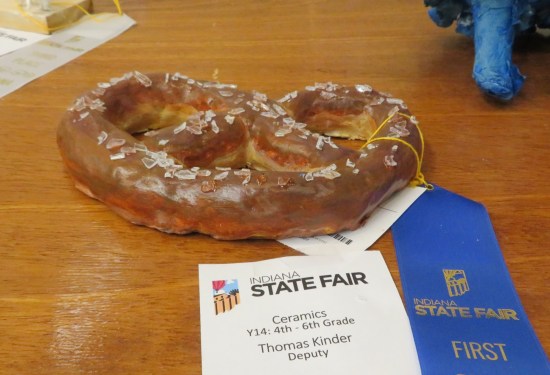 An accurately sculpted ceramic pretzel.