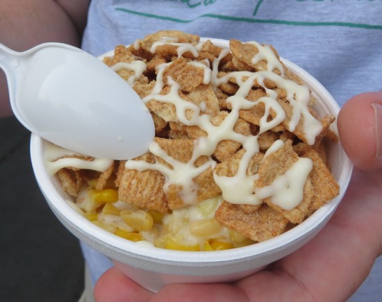 A paper bowl of Cinnamon Crunch Corn.
