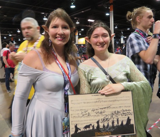 Clover the Fairy and Arwen! Holding some "Fellowship of the Ring" sheet music art