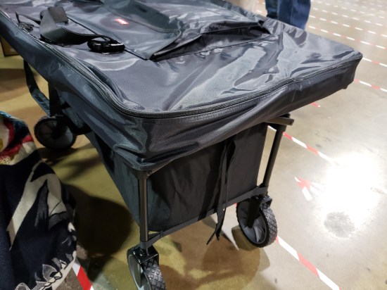 A small cart full of merchandise.