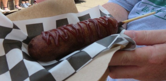 A darkened corn dog.