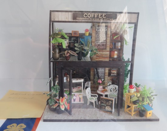 A tiny coffeehouse diorama.